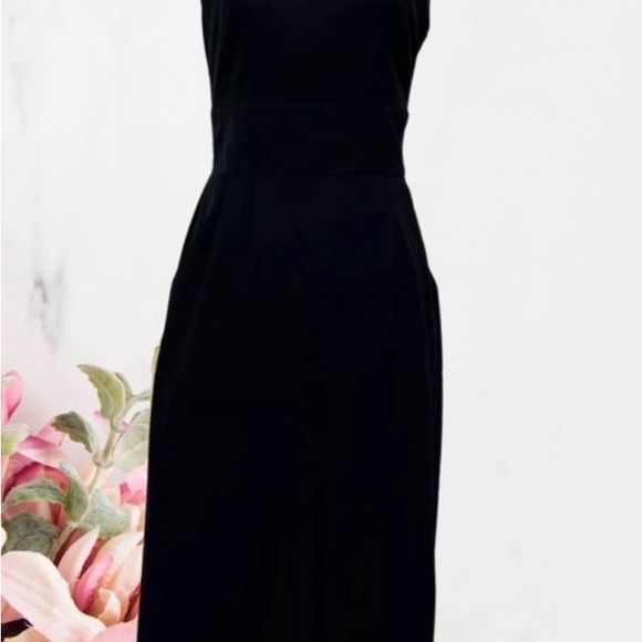 BB DAKOTA BLACK V-NECK CRISS-CROSS BACK
WIDE LEG JUMPSUIT SZ 6 - Picture 3 of 5